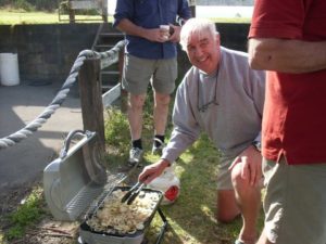 Graeme in front of BBQ